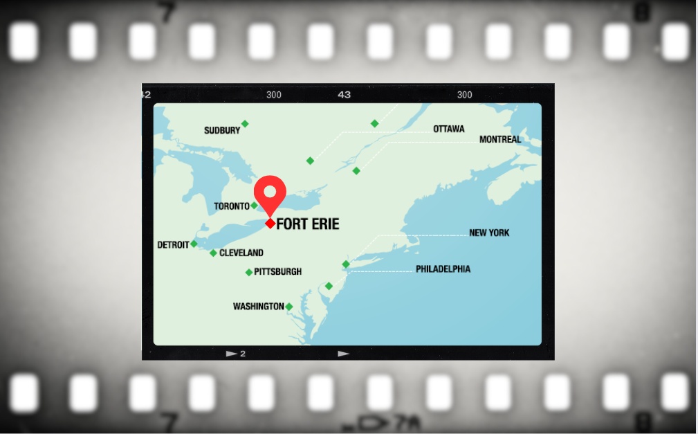 A large map of Fort Erie with film reels surrounding it