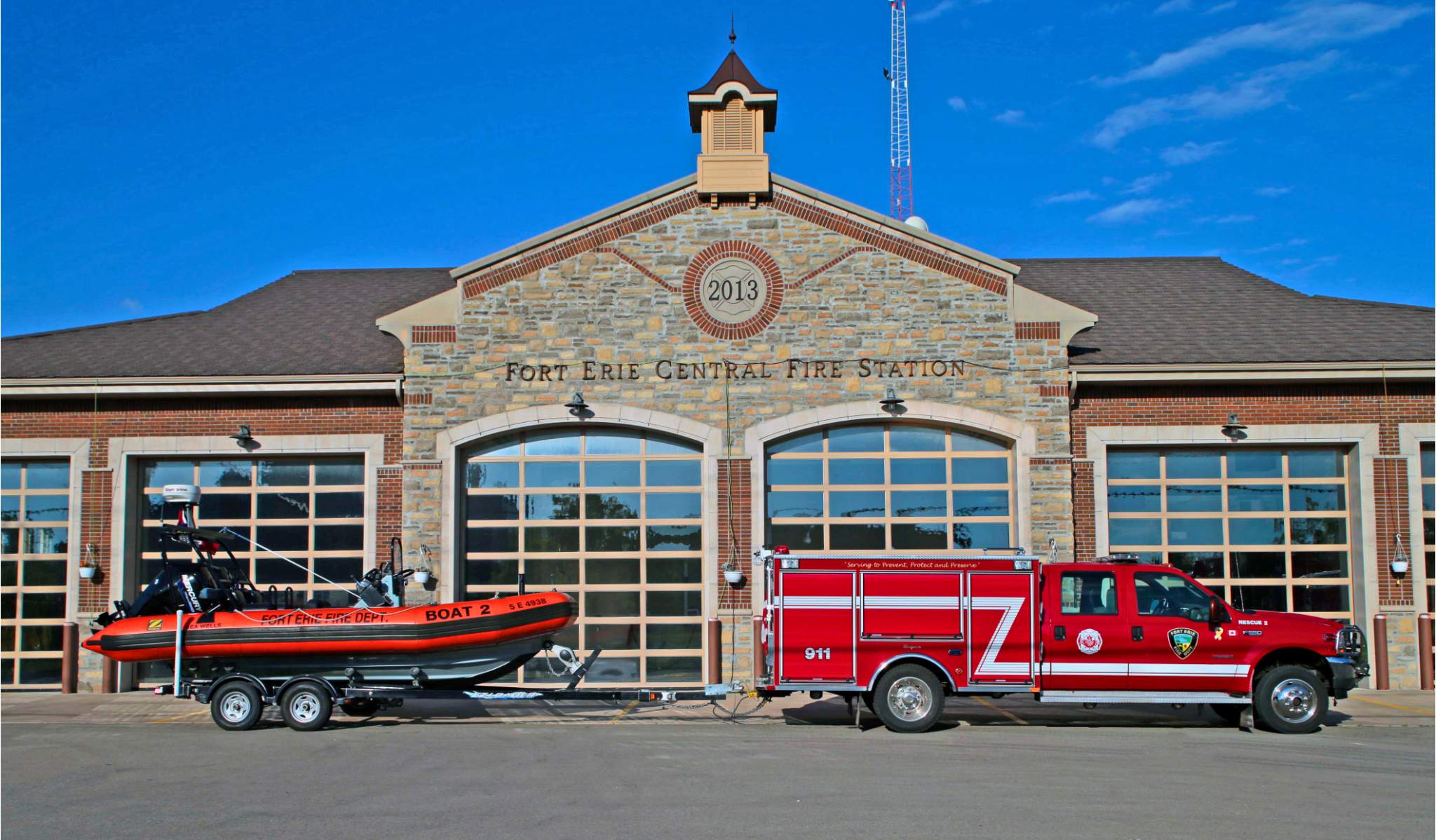 A fire truck connected to a boat