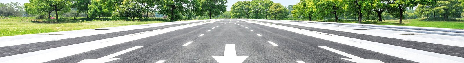 Road with directional arrows on it