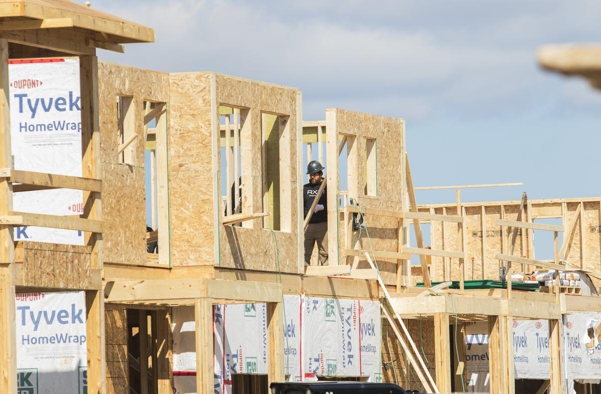 worker building a house