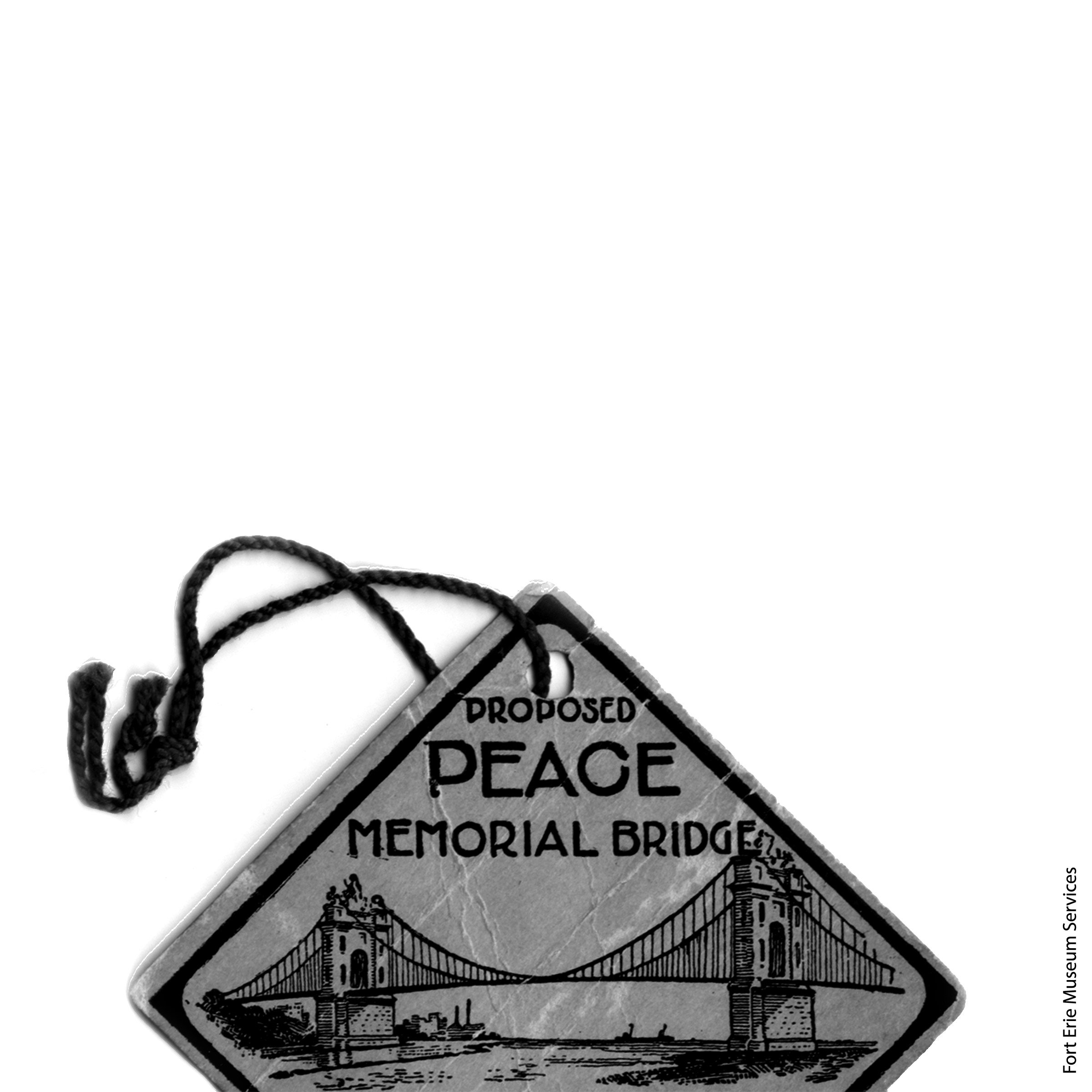 A diamond shaped tag that has Peace Memorial Bridge on it.