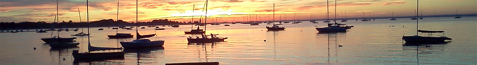 Sunsetting with boats in the water
