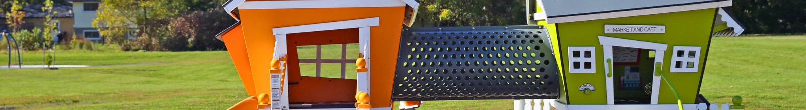 A small playground shaped like houses