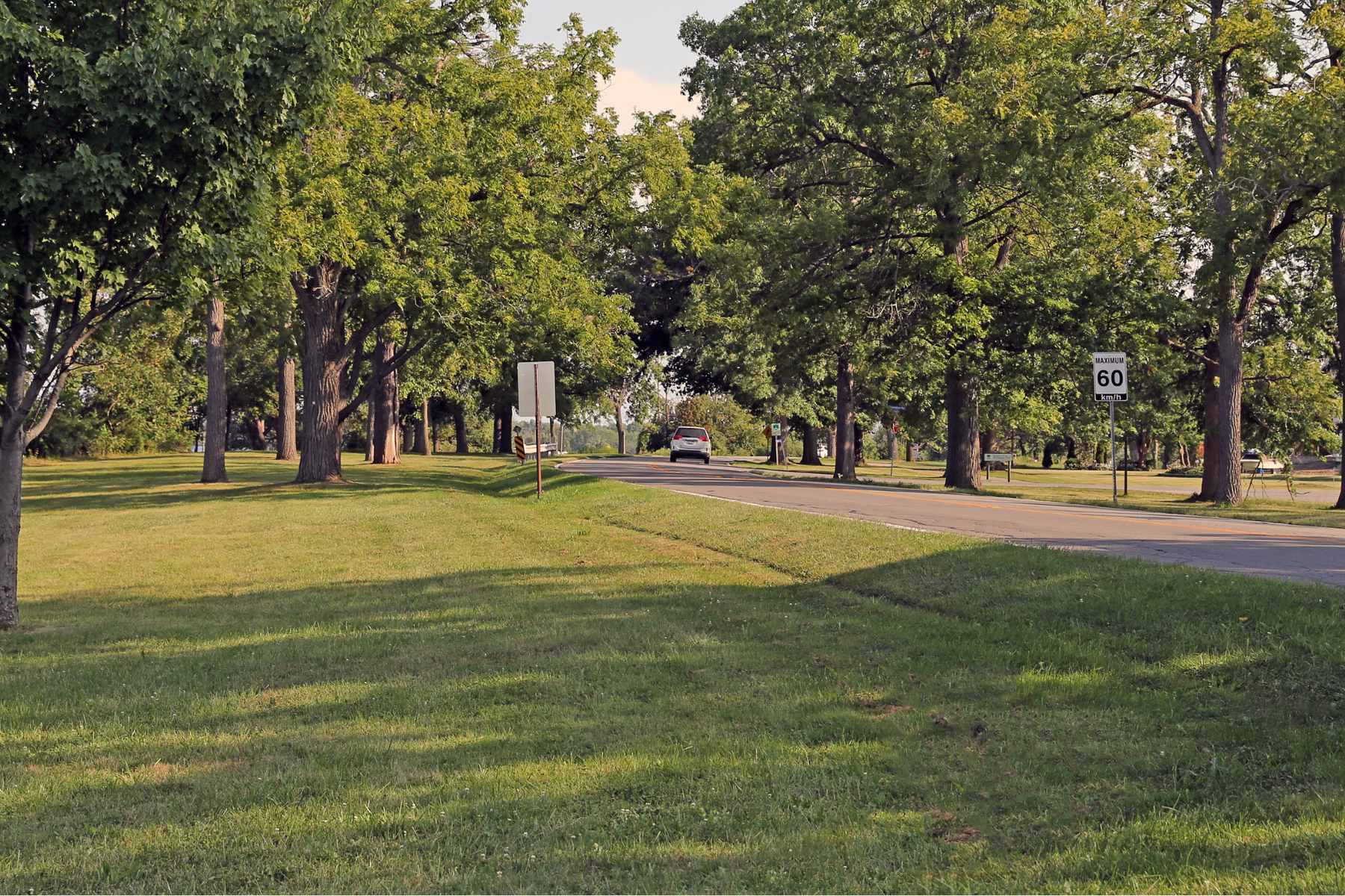 A car drives along a curved road