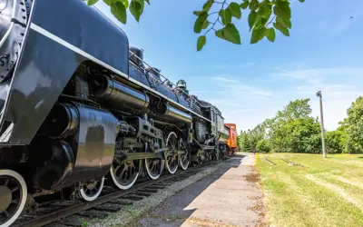 A large old train with train cars